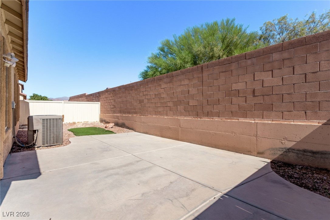 6224 Boulder Rise Street North Las Vegas, NV 89115 - Photo 24 of 27 Fenced backyard featuring a patio area