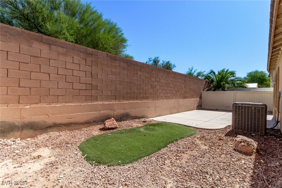 6224 Boulder Rise Street North Las Vegas, NV 89115 - Photo 25 of 27 Fenced backyard with a patio area