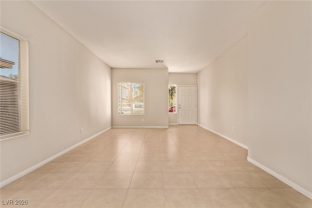 6224 Boulder Rise Street North Las Vegas, NV 89115 - Photo 7 of 27 Unfurnished room featuring baseboards and light tile patterned floors