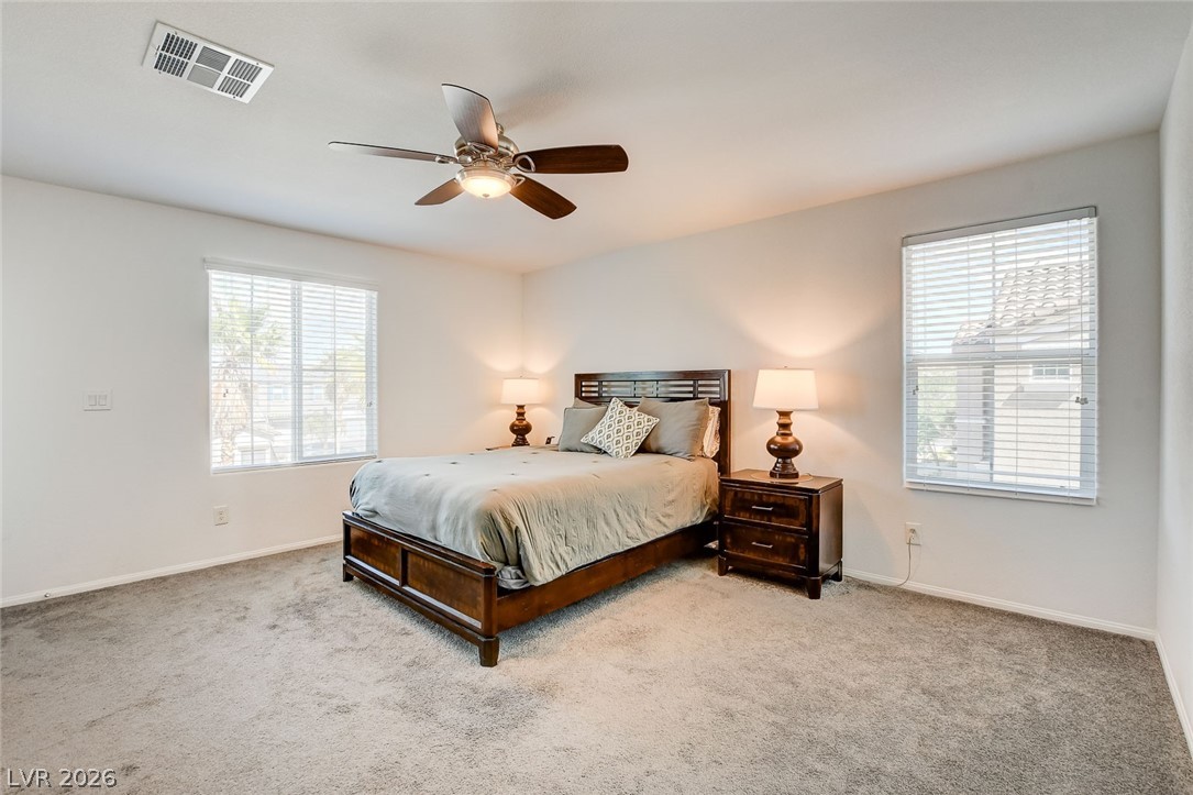 484 Filaree Place Henderson, NV 89015 - Photo 42 of 71 This bright and airy bedroom provides comfort and tranquility for restful nights.