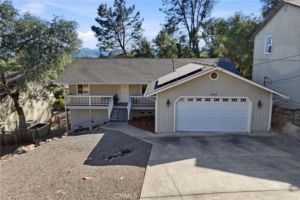 18685 Oak Grove Road Hidden Valley Lake, CA 95467 - Photo 35 of 52 a view of a house with a yard