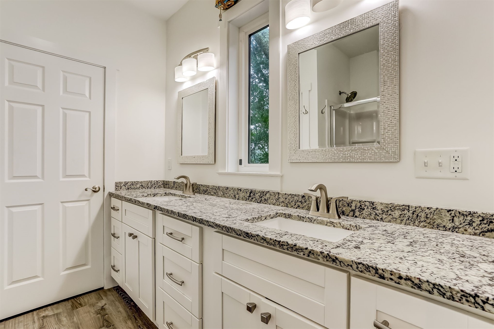 1421 Hickory Street Fernandina Beach, FL 32034 - Photo 11 of 22 a bathroom with a granite countertop sink and a mirror