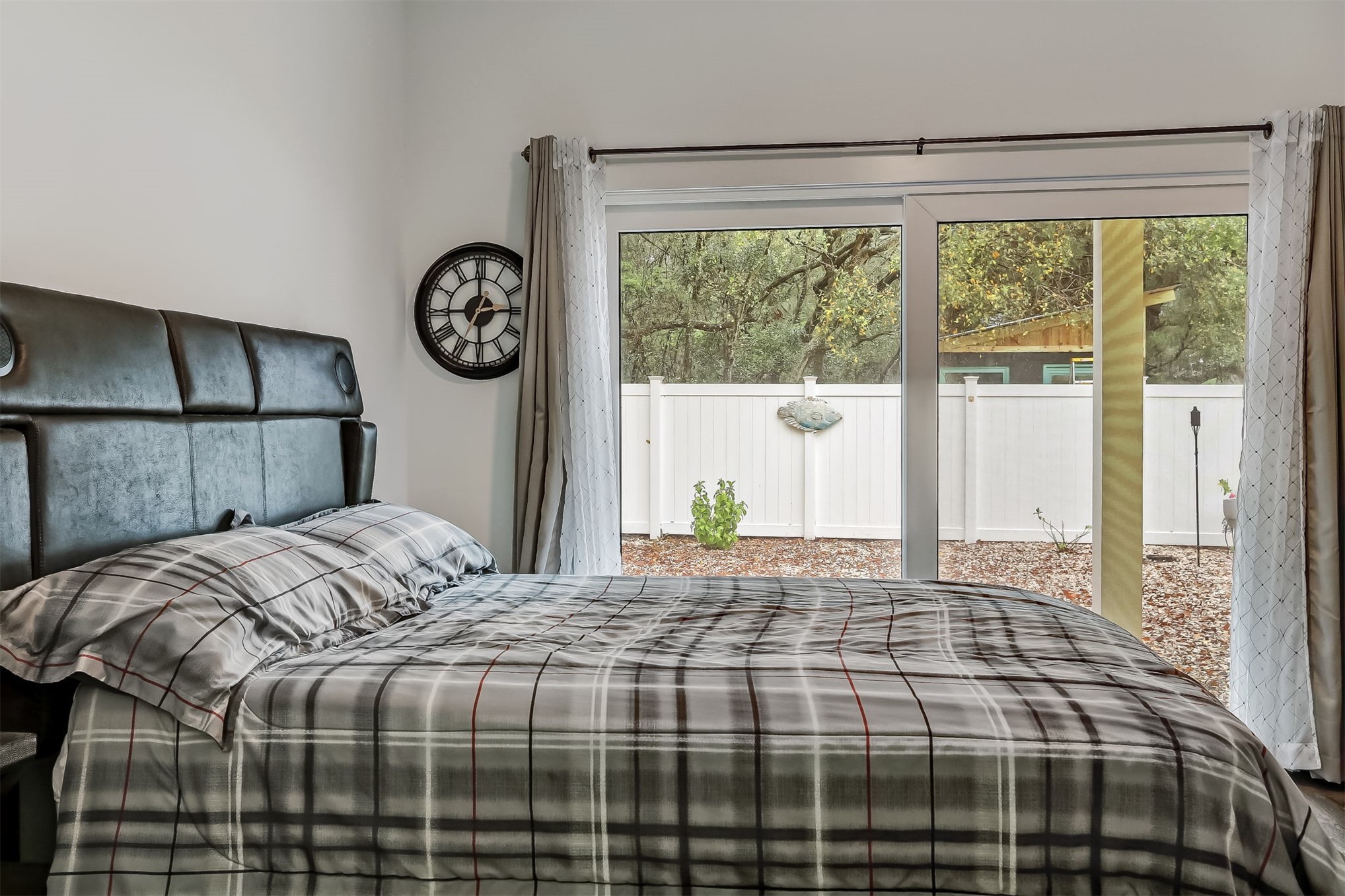 1421 Hickory Street Fernandina Beach, FL 32034 - Photo 13 of 22 a bedroom with a bed and a window