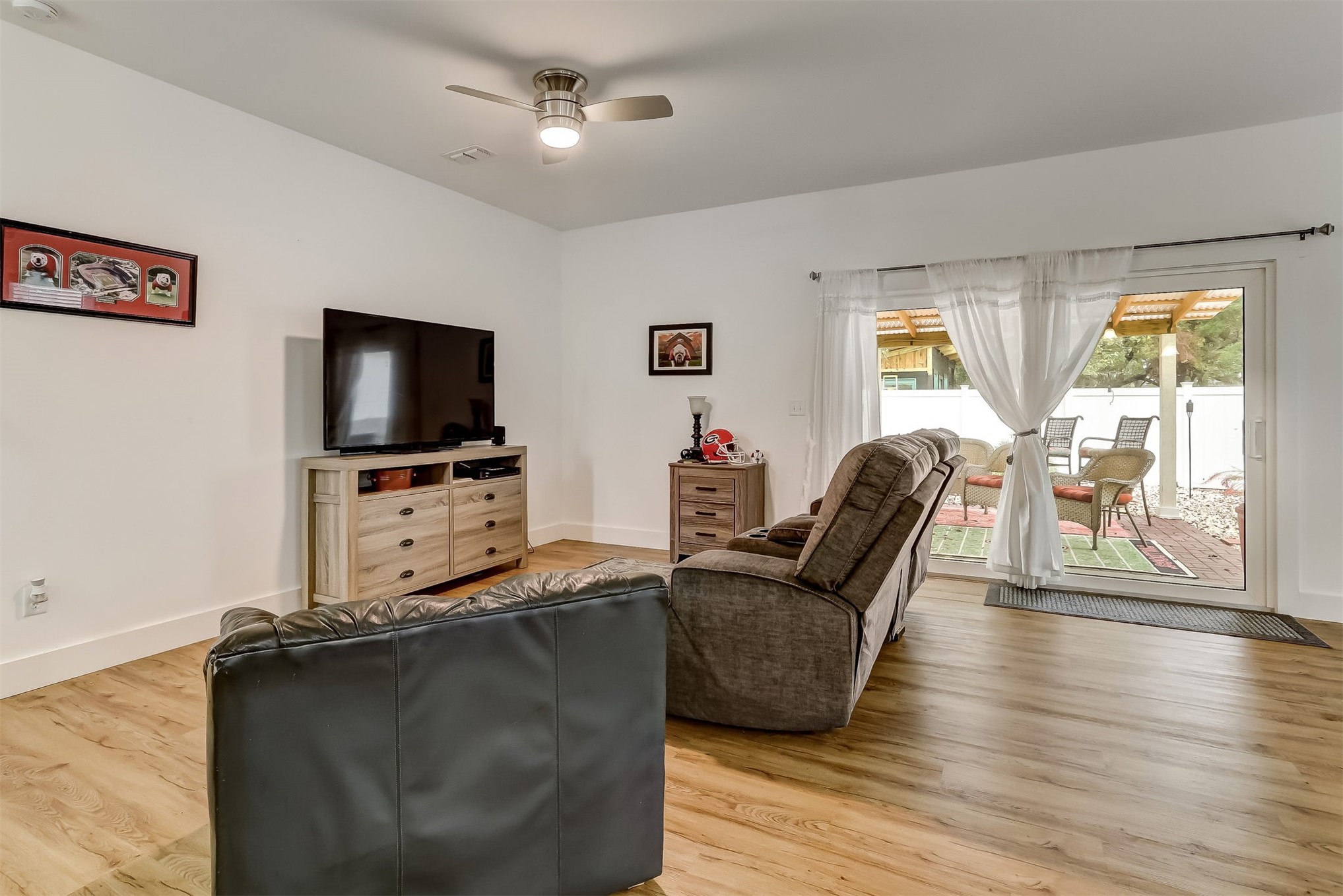 1421 Hickory Street Fernandina Beach, FL 32034 - Photo 4 of 22 a living room with furniture and a flat screen tv