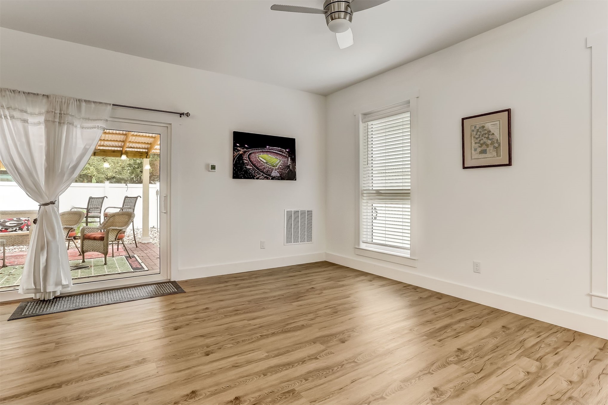 1421 Hickory Street Fernandina Beach, FL 32034 - Photo 9 of 22 a view of livingroom with hardwood floor and window