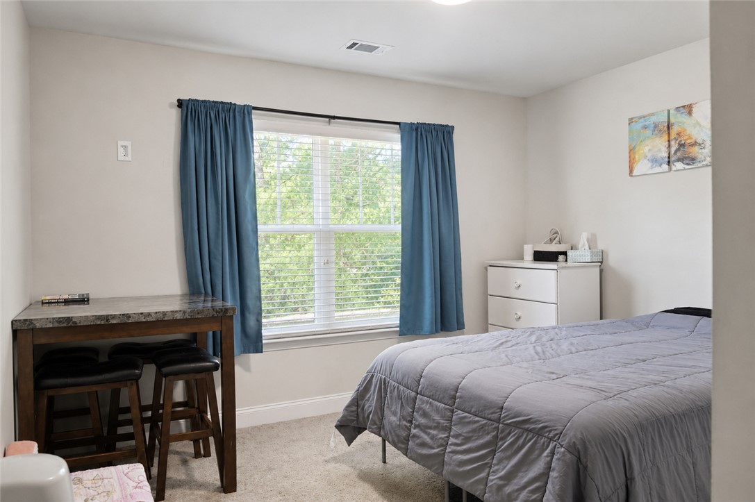 102 Ventura Street Anderson, SC 29621 - Photo 17 of 24 A well-lit room offering a peaceful retreat, perfect for relaxation or a home office.