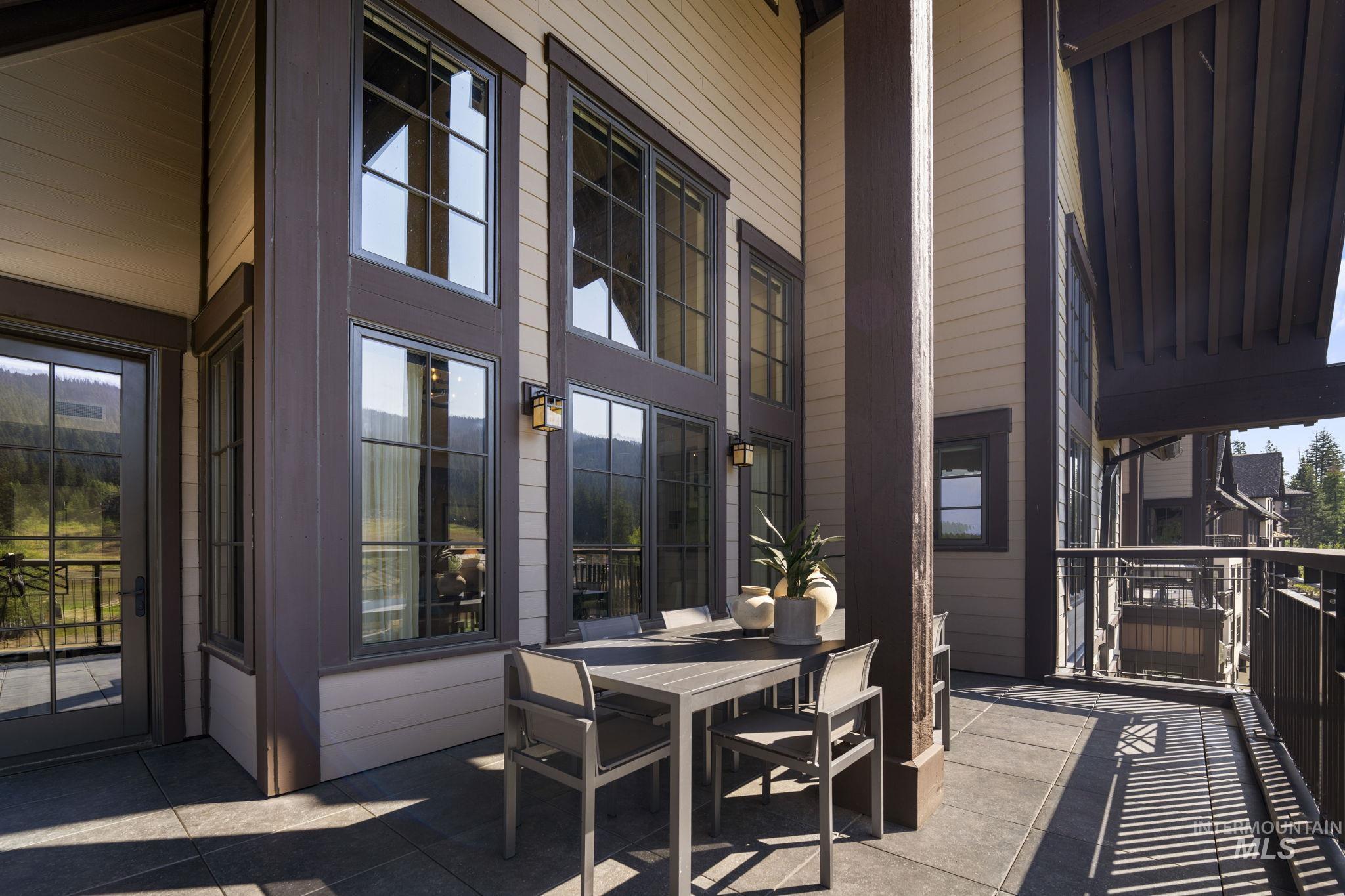 700 Village Drive, Unit 403 Donnelly, ID 83615 - Photo 19 of 43 View of patio featuring outdoor dining space
