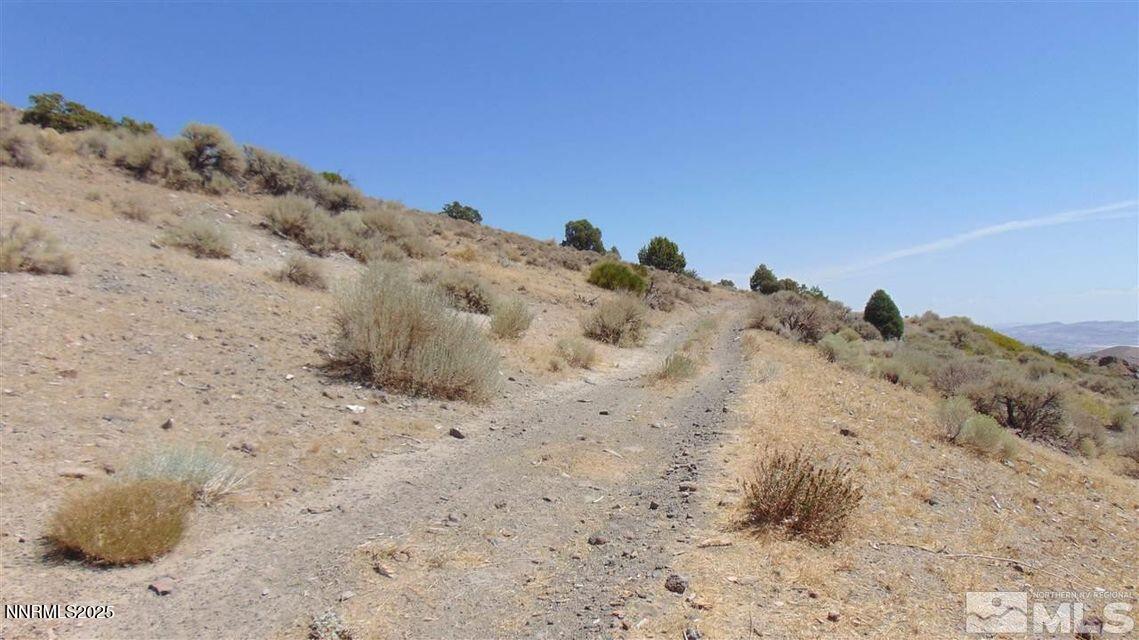 429110 Sutro Springs Road, Unit 429110 Dayton, NV 89403 - Photo 7 of 12 a view of a beach with a mountain view