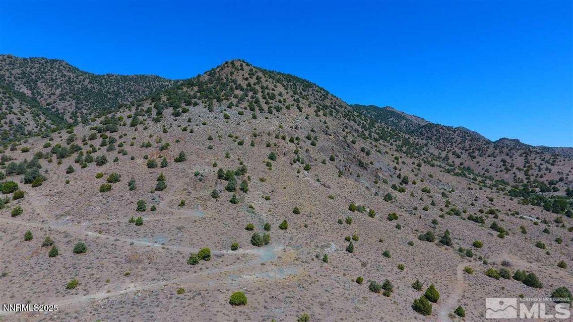 429110 Sutro Springs Road, Unit 429110 Dayton, NV 89403 - Photo 9 of 12 a view of a large building with a view of mountains
