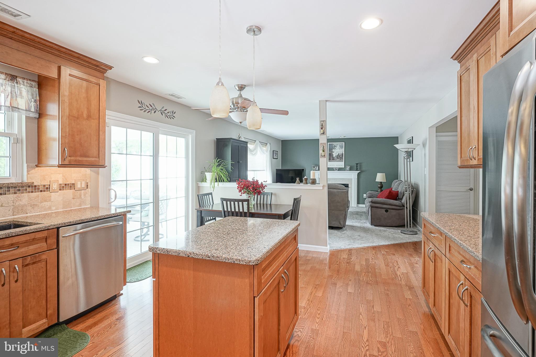 14 Filly Way Sewell, NJ 08080 - Photo 14 of 44 a kitchen with stainless steel appliances granite countertop sink stove top oven and refrigerator