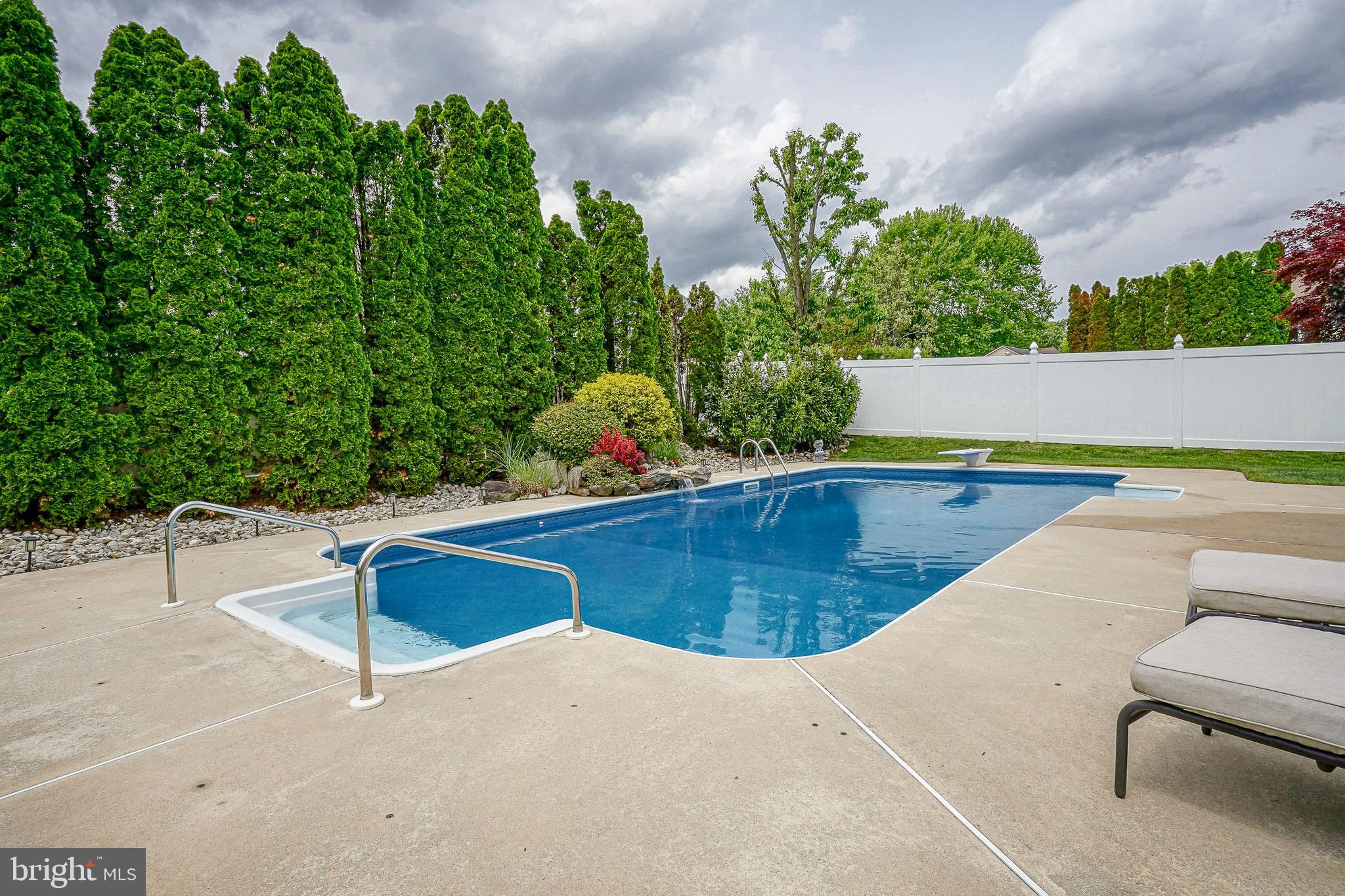 14 Filly Way Sewell, NJ 08080 - Photo 41 of 44 a view of a swimming pool with a patio