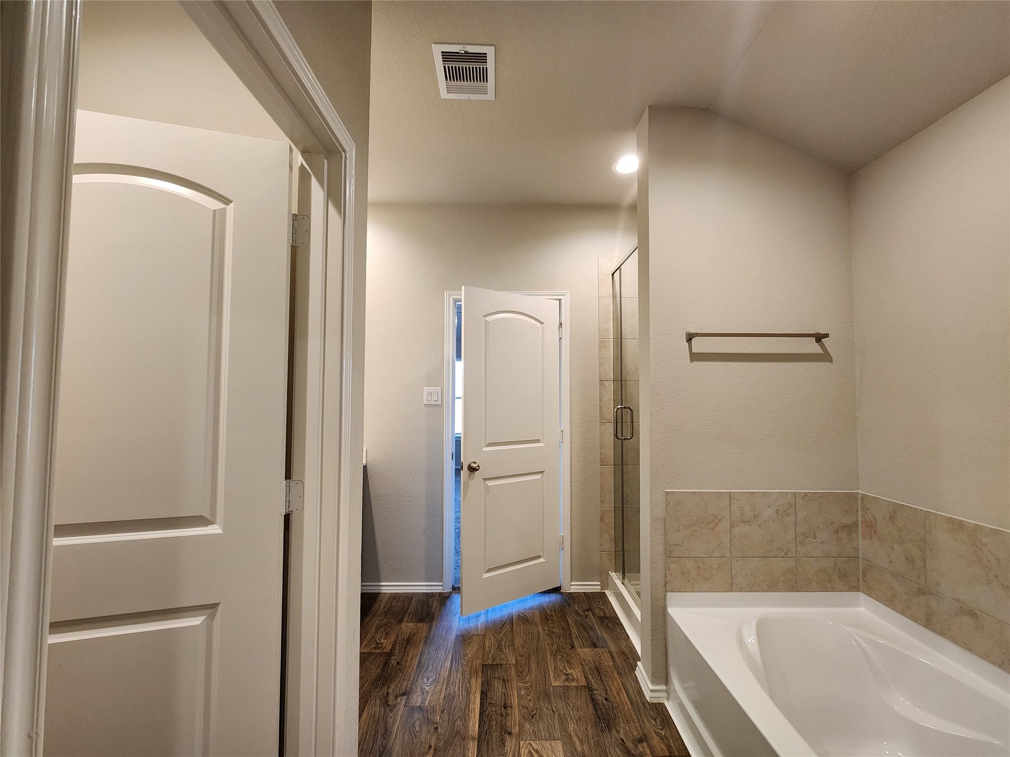 18277 Eaton Mill Drive New Caney, TX 77357 - Photo 18 of 28 a bathroom with a tub and shower