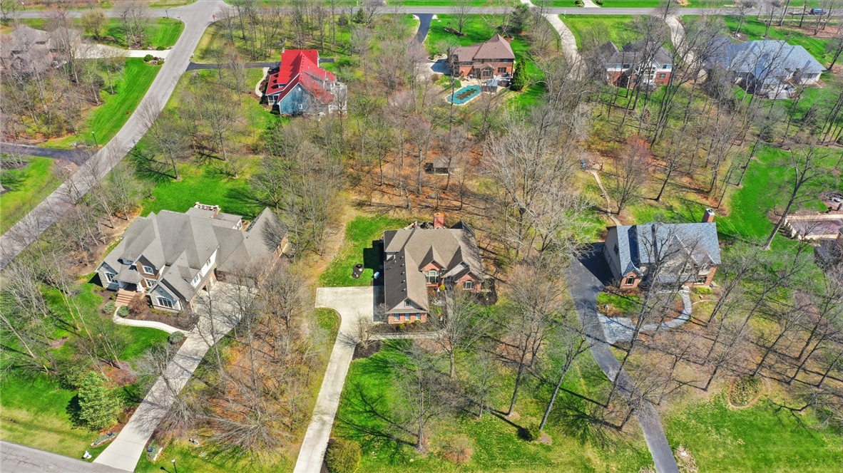 472 Timber Walk Court Springboro, OH 45066 - Photo 79 of 86 This elevated view showcases multiple residences nestled amongst lush, green surroundings.