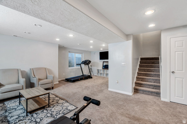 11007 Birch Creek Road South Jordan, UT 84095 - Photo 23 of 35 This flexible room is perfect for entertaining and relaxing
