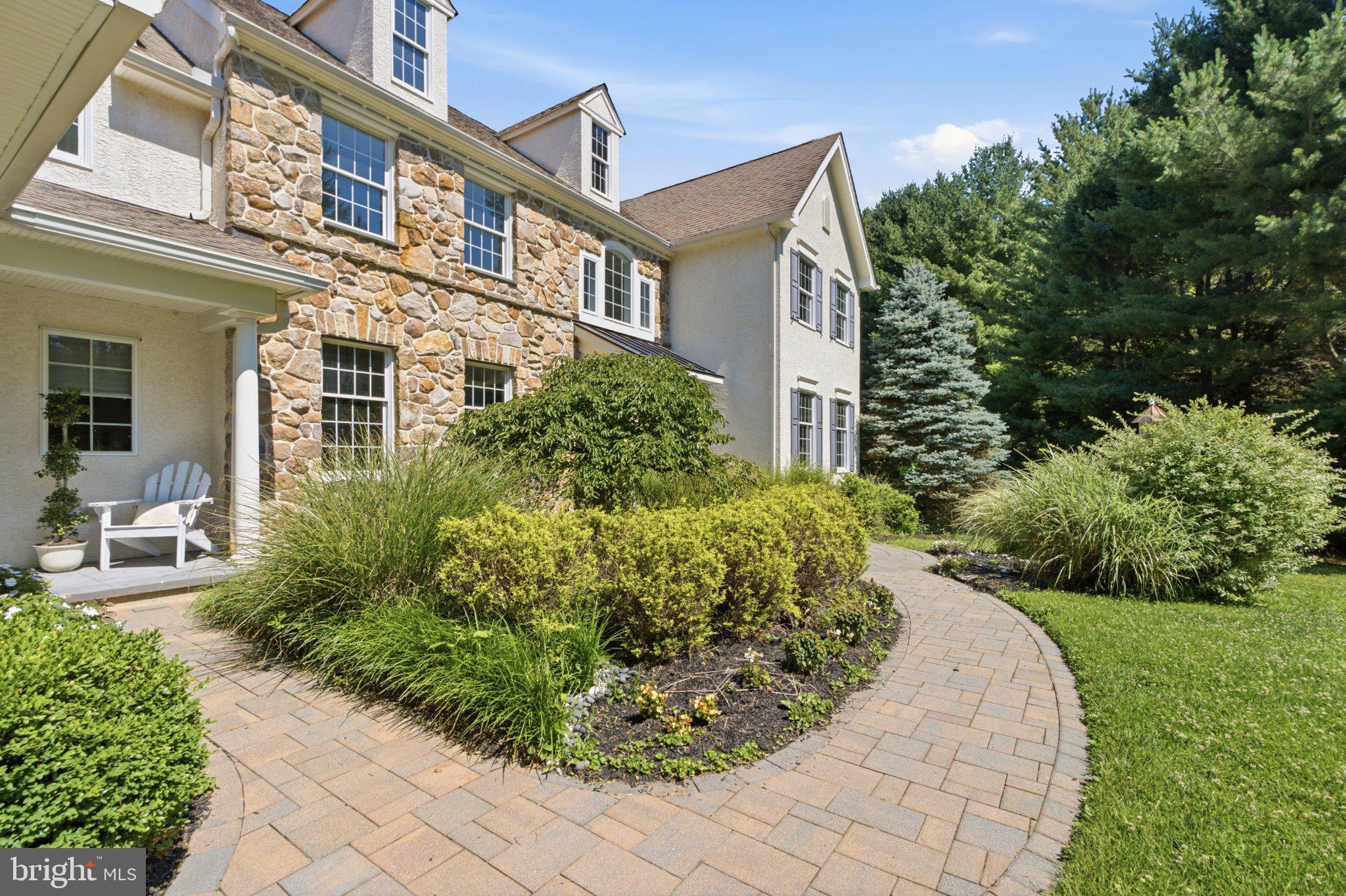 342 Ring Road Chadds Ford, PA 19317 - Photo 95 of 95 Charming stone facade with lush gardens.