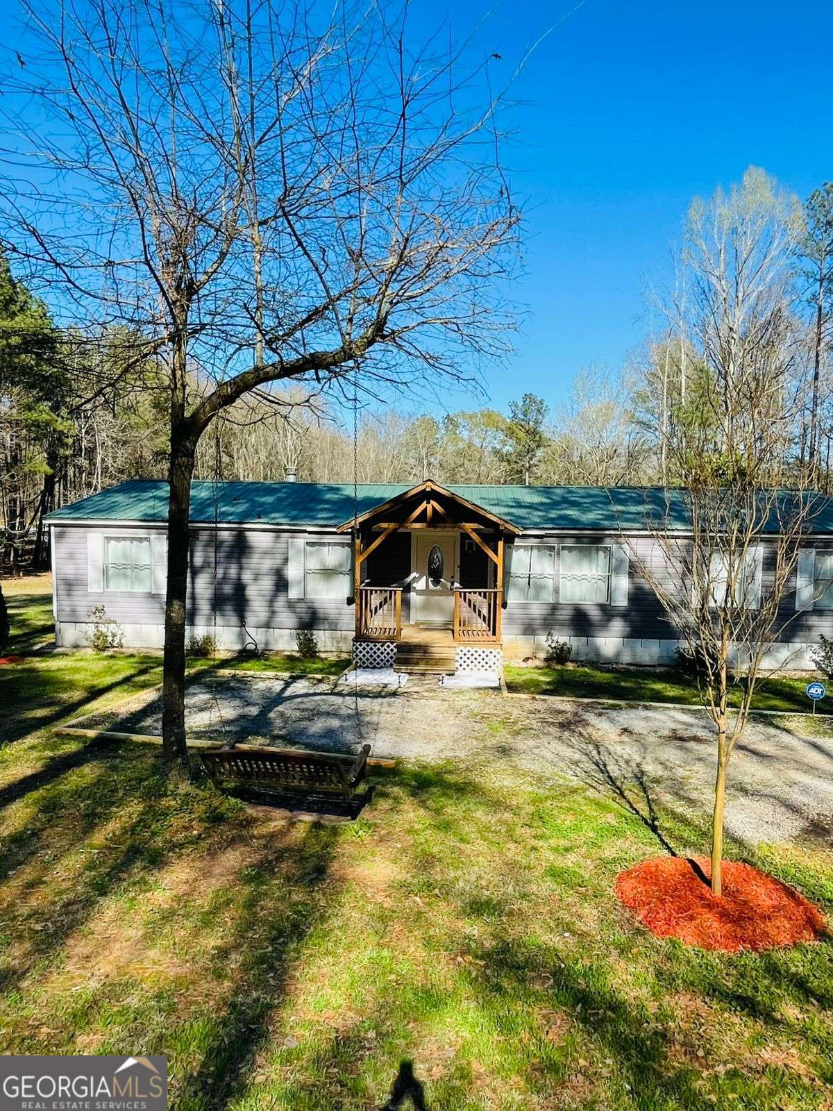 489 Childers Road Colbert, GA 30628 - Photo 1 of 1 a view of a house with swimming pool