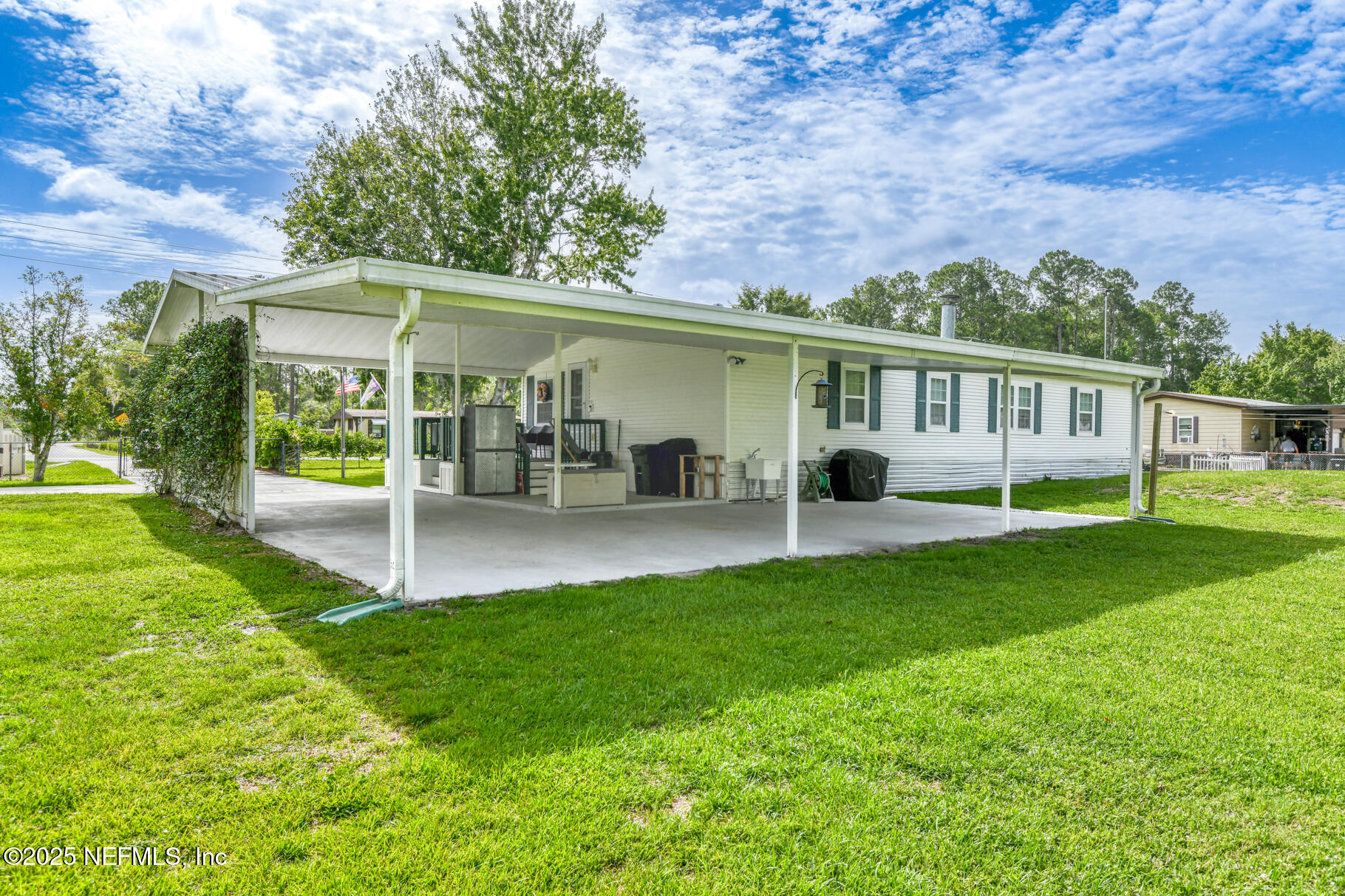 203 Horse Landing Road Satsuma, FL 32189 - Photo 32 of 39 carport/patio