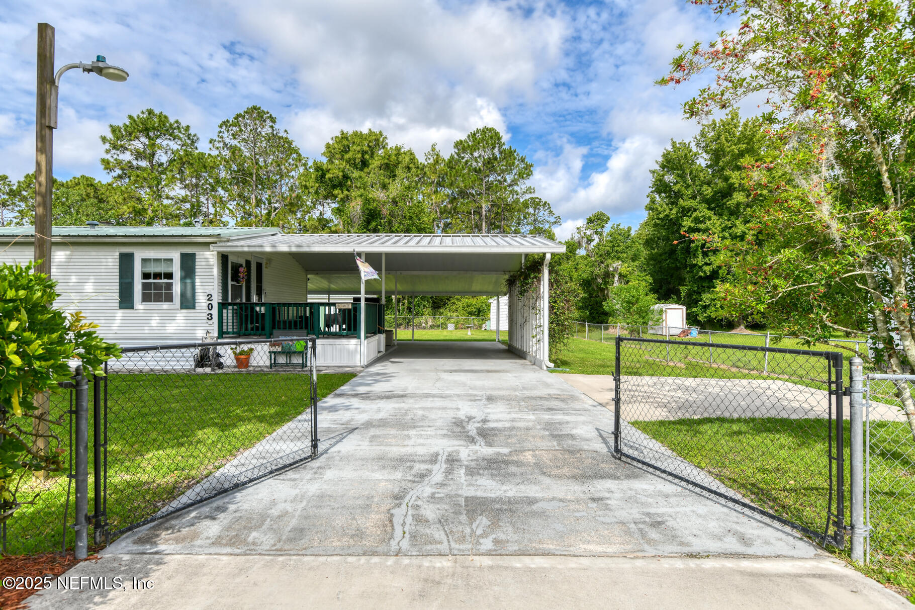 203 Horse Landing Road Satsuma, FL 32189 - Photo 4 of 39 concrete driveway