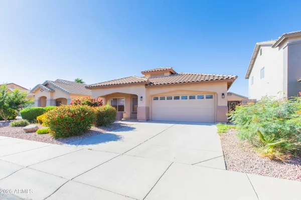 a view of a house with a garage