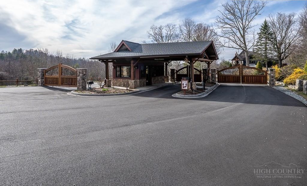 485 Woodlake Loop Road Elk Park, NC 28622 - Photo 42 of 44 a view of a car park in front of house