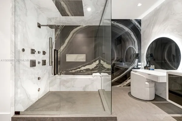 a kitchen with a sink and a stove top oven