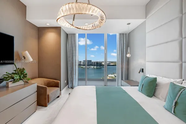 a bathroom with a bathtub shower sink and mirror