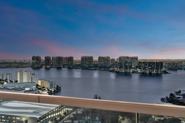 a view of a lake from a balcony