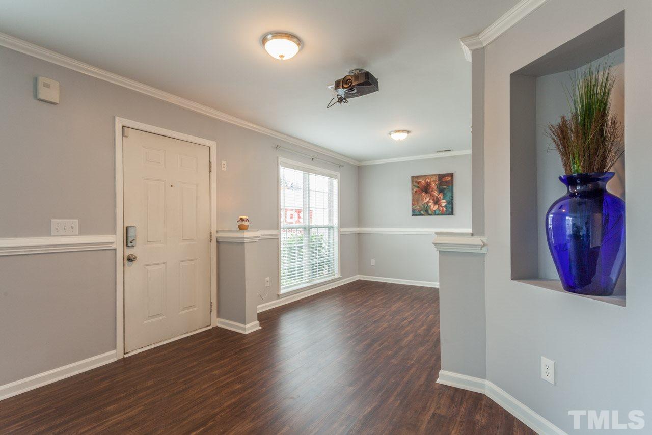 5216 Cardinal Grove Boulevard Raleigh, NC 27616 - Photo 2 of 25 wooden floor in an empty room