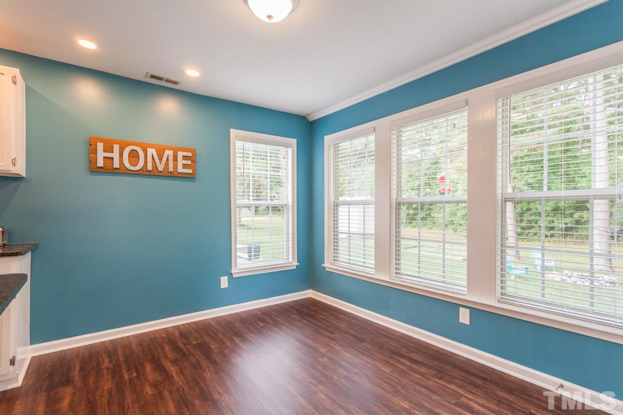 5216 Cardinal Grove Boulevard Raleigh, NC 27616 - Photo 12 of 25 a view of an empty room with a window