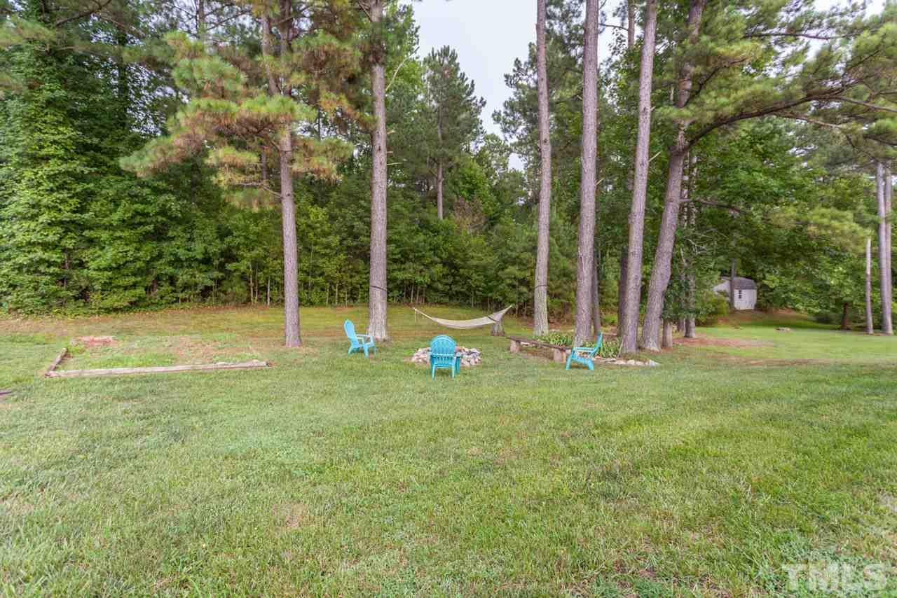 5216 Cardinal Grove Boulevard Raleigh, NC 27616 - Photo 22 of 25 a view of a park with large trees