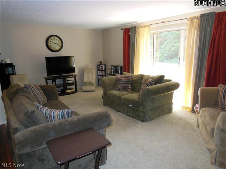 6476 State Road, Unit H12 Cleveland, OH 44134 - Photo 6 of 15 sliding door walks out onto the balcony that over looks the woods!
