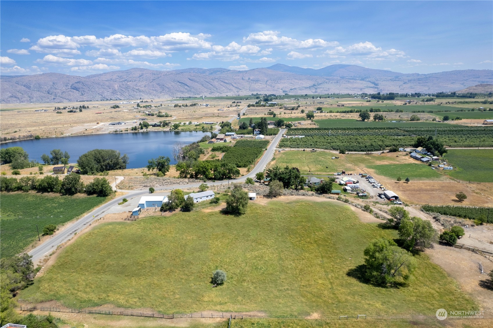50 Soren Peterson Road Riverside, WA 98849 - Photo 3 of 37 a view of a lake with a mountain