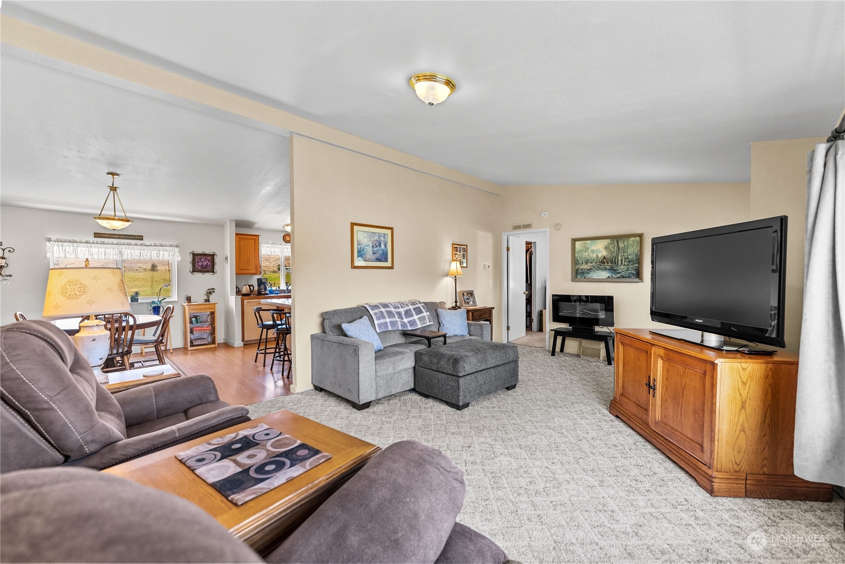 50 Soren Peterson Road Riverside, WA 98849 - Photo 6 of 37 a living room with furniture and a flat screen tv