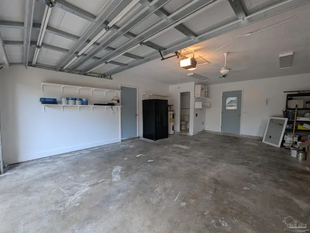 a view of room window and a fireplace