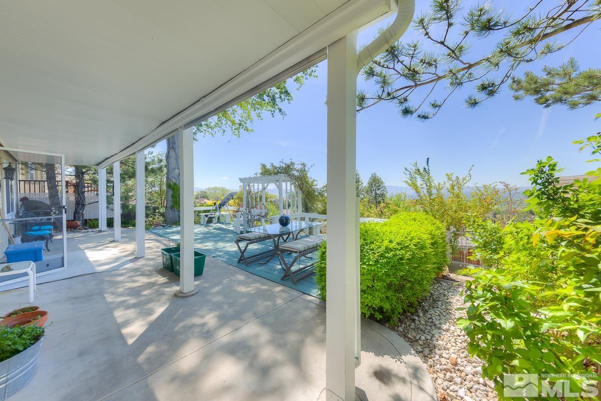 642 Talus Way Reno, NV 89503 - Photo 30 of 40 a view of a porch with chairs and backyard