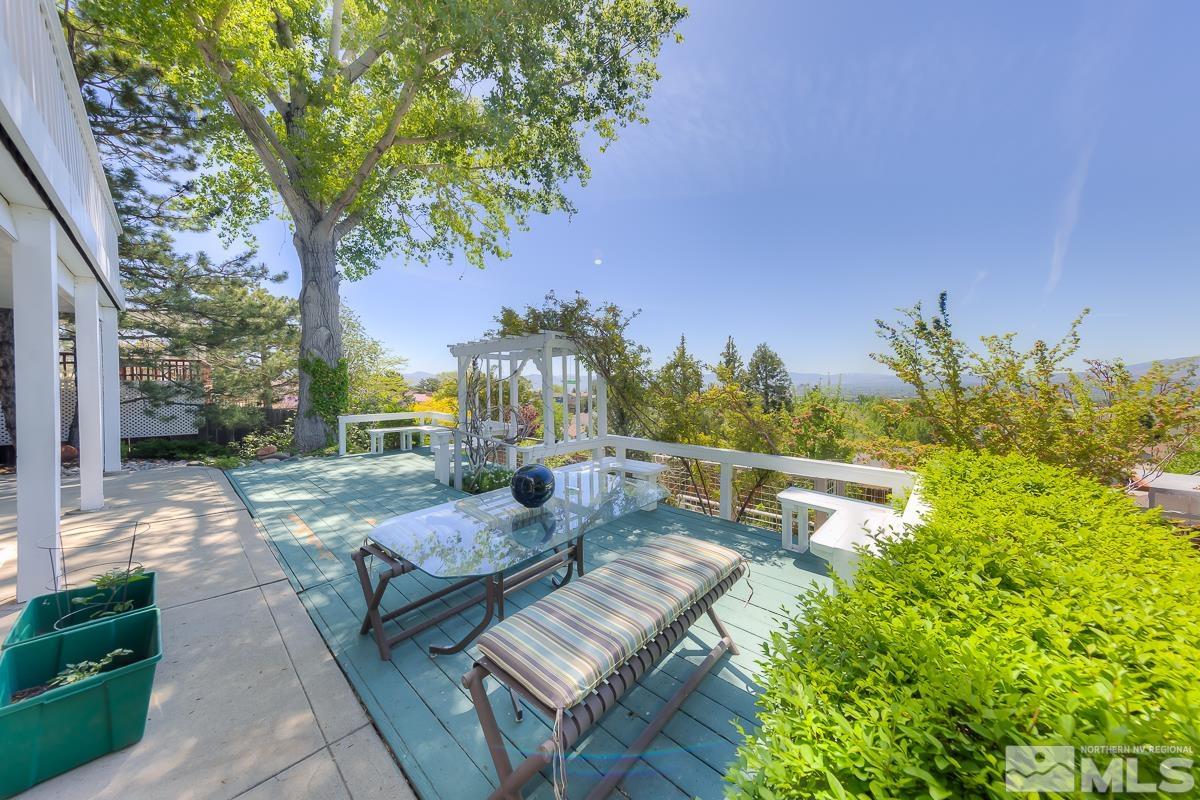 642 Talus Way Reno, NV 89503 - Photo 39 of 40 a view of a patio with couches table and chairs and potted plants