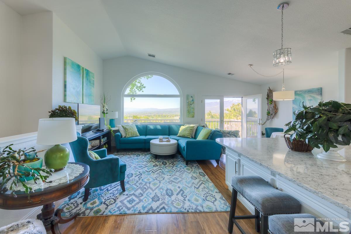 642 Talus Way Reno, NV 89503 - Photo 5 of 40 a living room with furniture and a large window