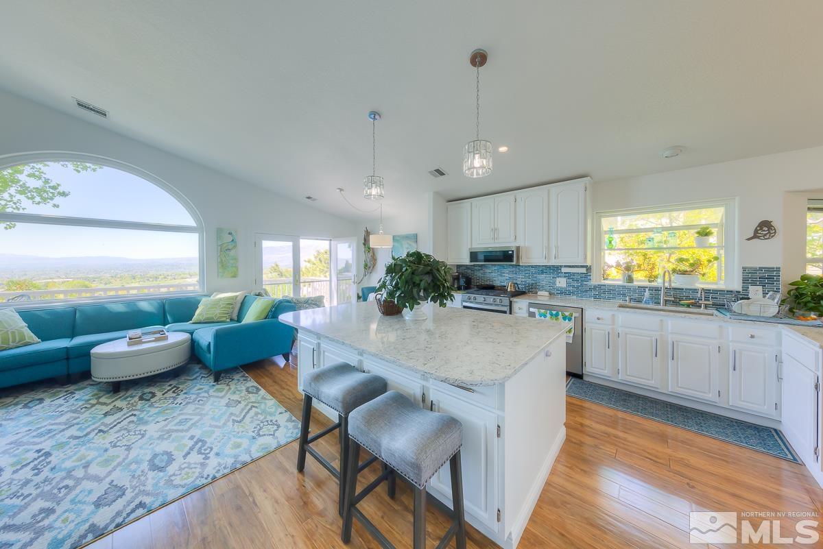 642 Talus Way Reno, NV 89503 - Photo 8 of 40 a large white kitchen with a large window
