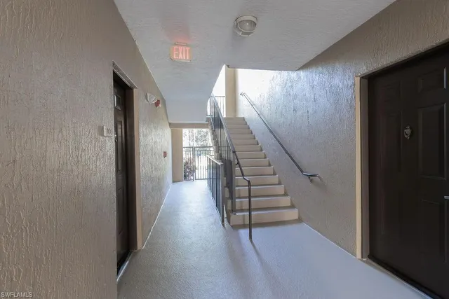 a view of a hallway with entryway