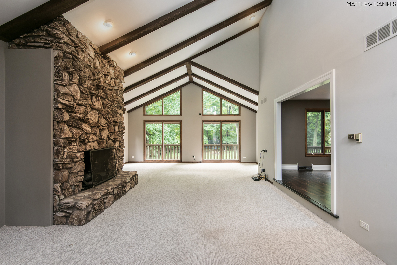 584 Aberdeen Road Frankfort, IL 60423 - Photo 12 of 60 a view of an empty room with a fireplace and a window