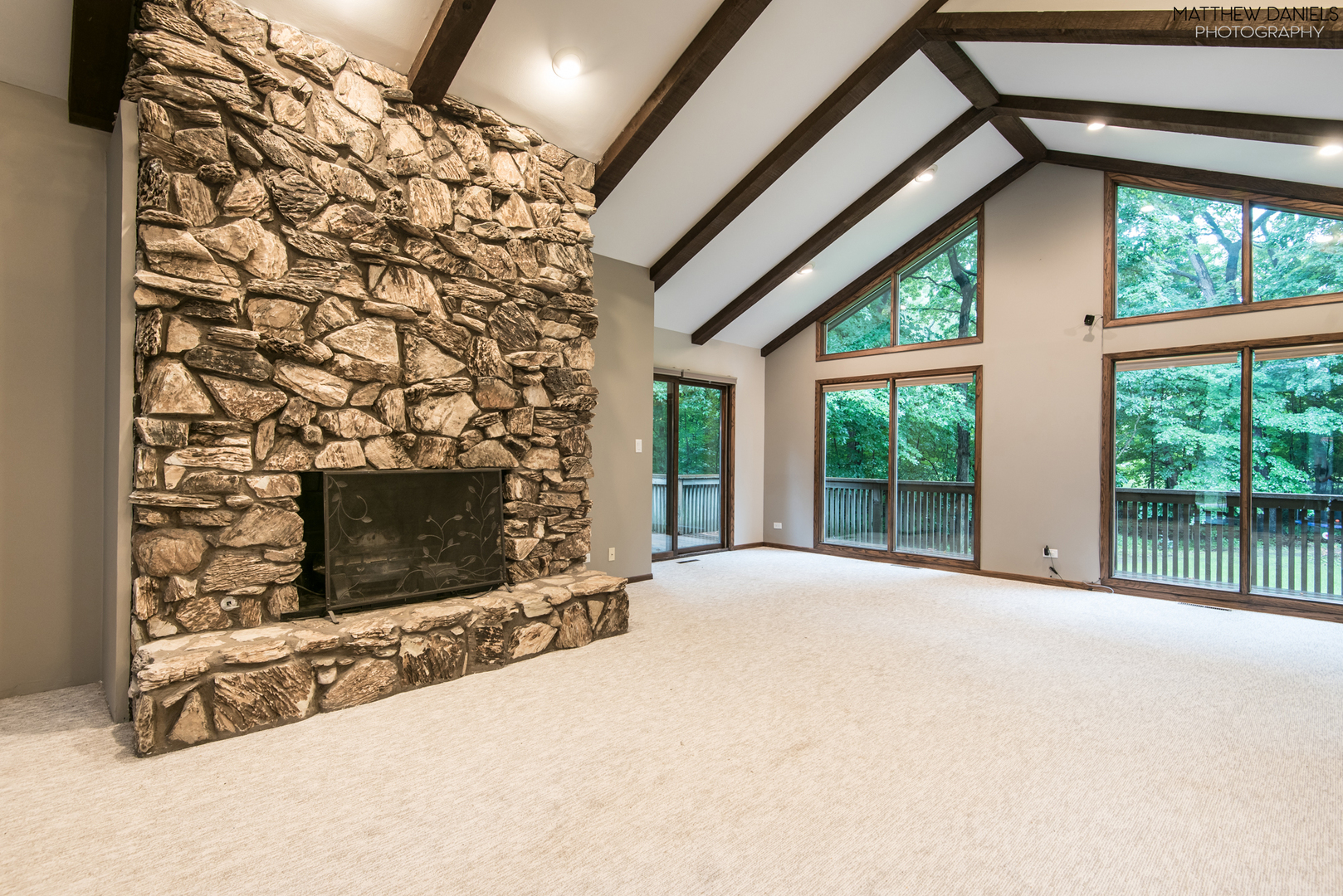 584 Aberdeen Road Frankfort, IL 60423 - Photo 13 of 60 a living room with a fireplace and a flat screen tv