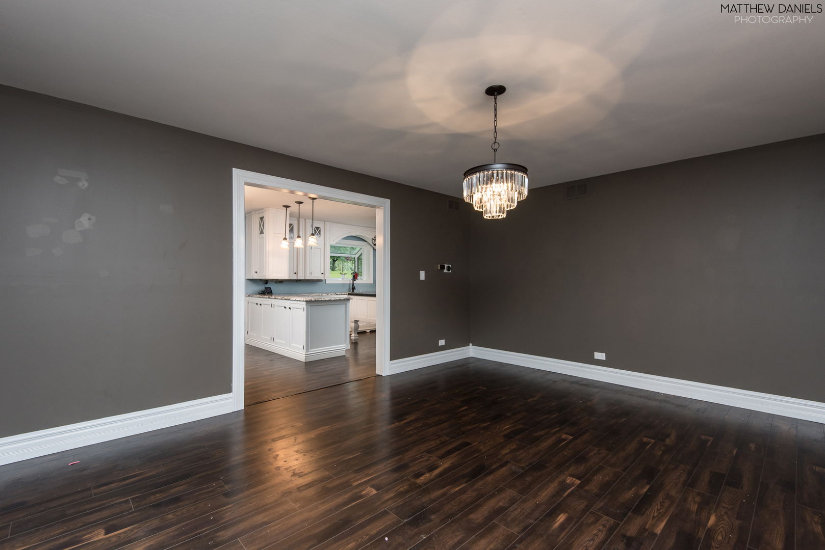 584 Aberdeen Road Frankfort, IL 60423 - Photo 26 of 60 a view of a room with wooden floor kitchen view and a window