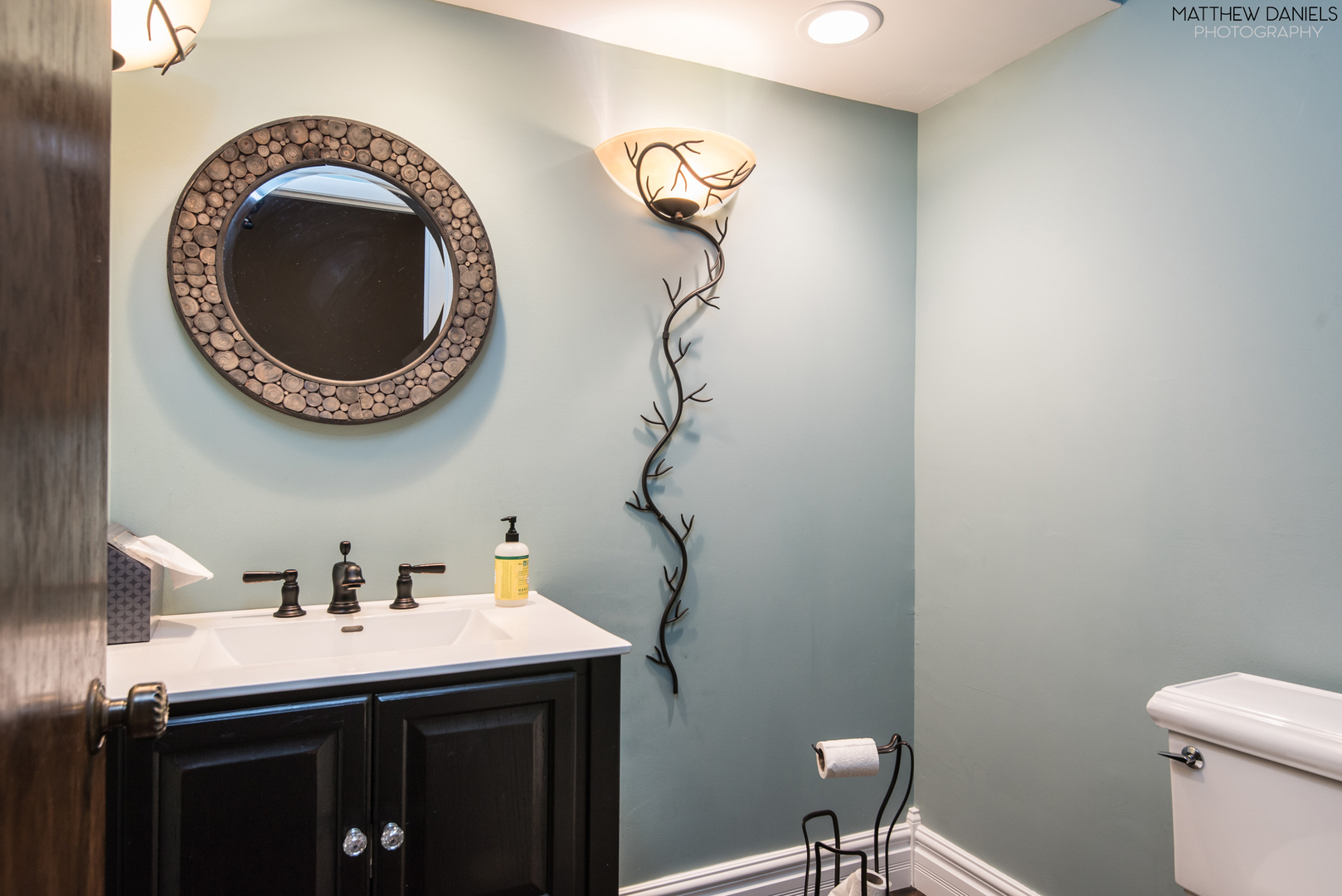 584 Aberdeen Road Frankfort, IL 60423 - Photo 28 of 60 a bathroom with a sink and a mirror
