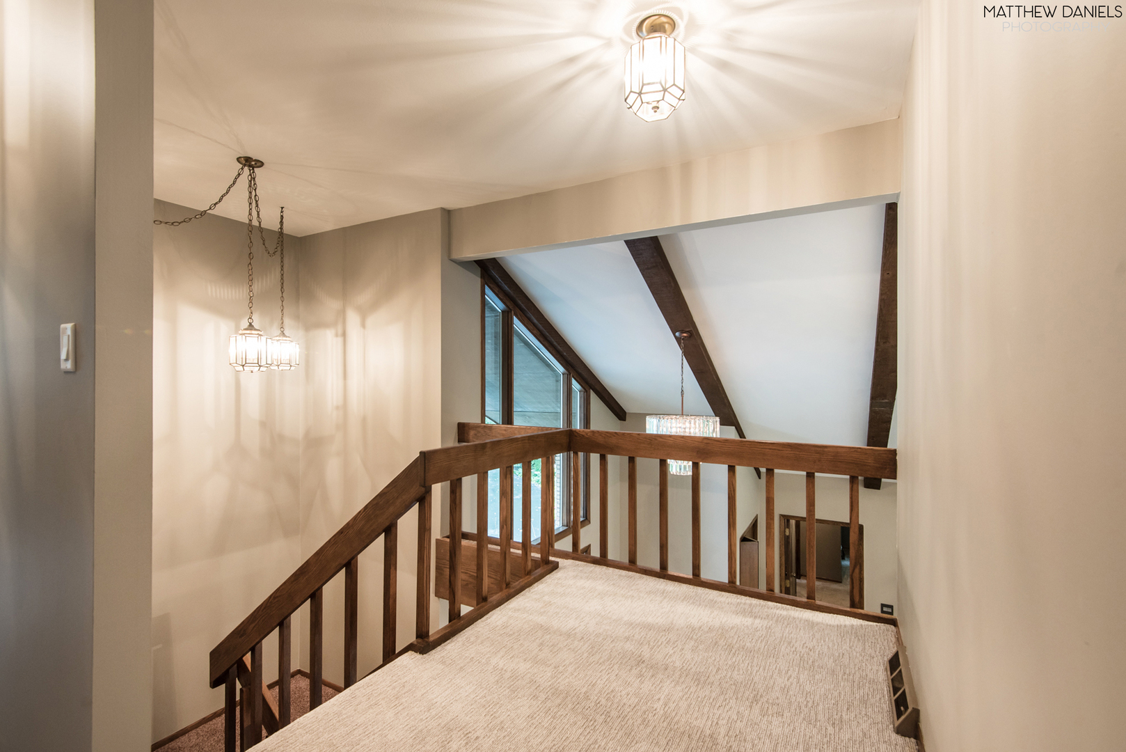 584 Aberdeen Road Frankfort, IL 60423 - Photo 44 of 60 a view of staircase with railing and a chandelier fan
