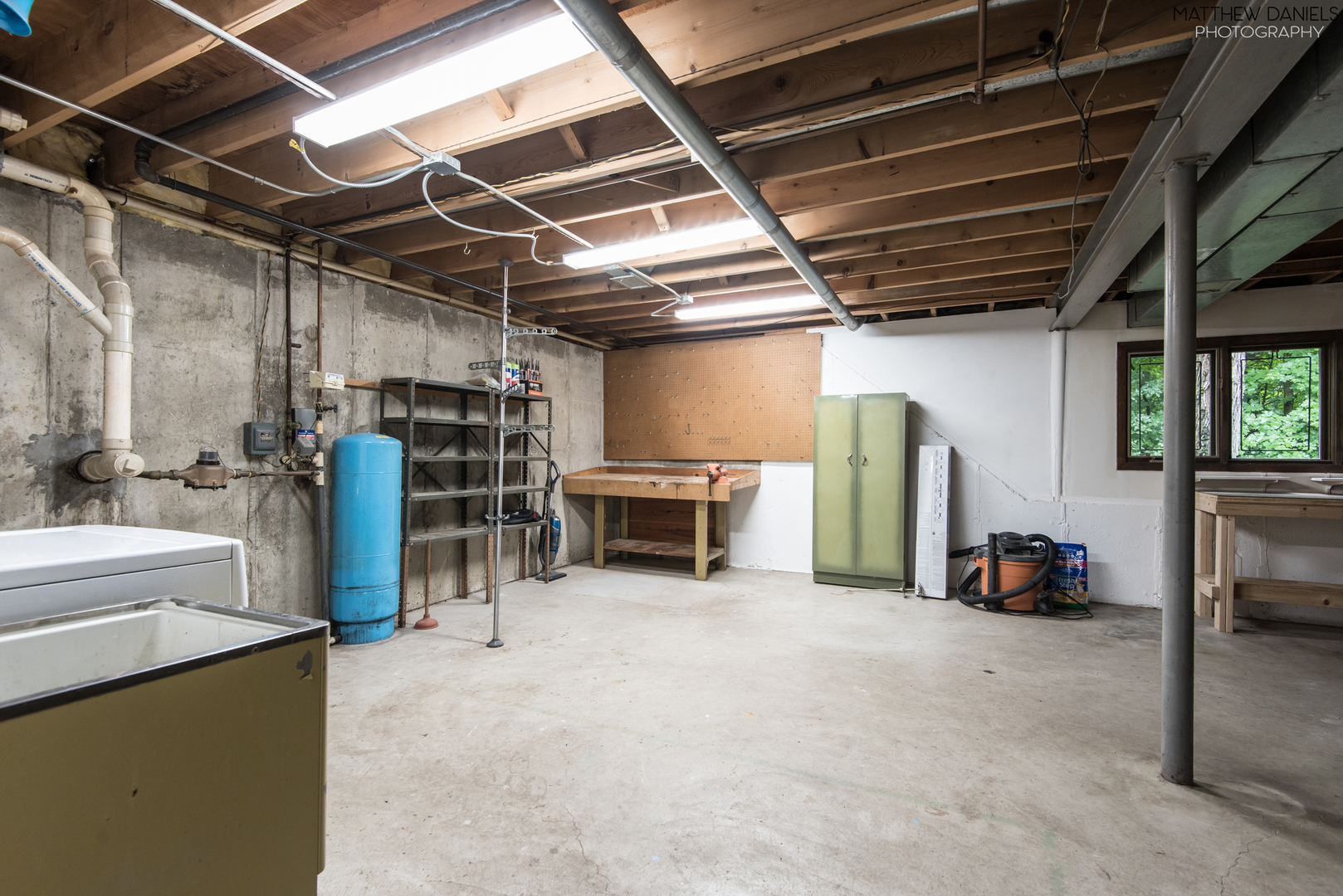 584 Aberdeen Road Frankfort, IL 60423 - Photo 48 of 60 a view of a car garage with furniture