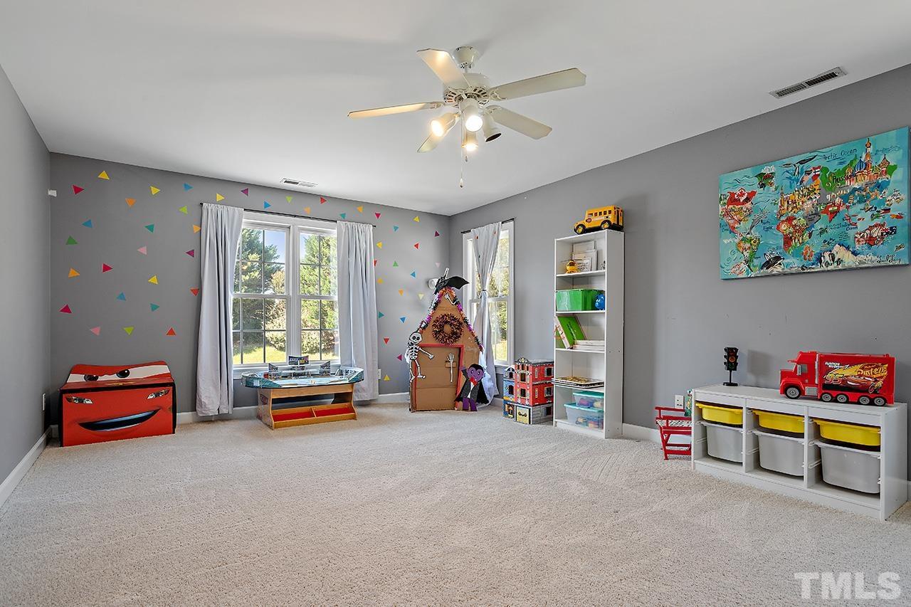 709 Rushing Falls Place Fuquay-Varina, NC 27526 - Photo 21 of 28 a children room with toys