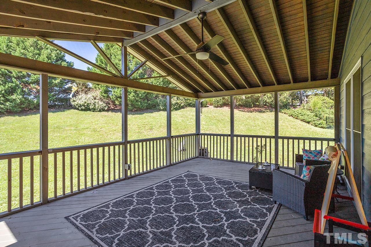 709 Rushing Falls Place Fuquay-Varina, NC 27526 - Photo 26 of 28 a view of a porch with wooden floor