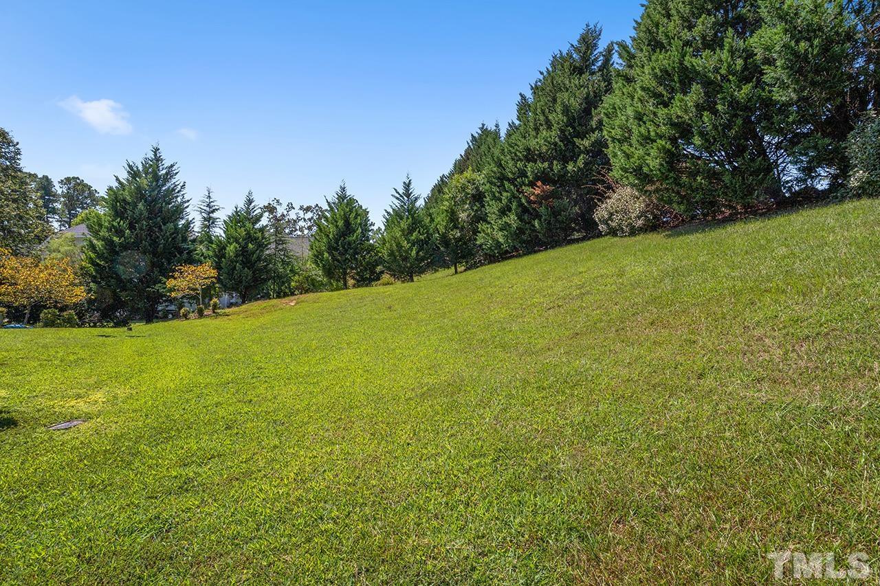 709 Rushing Falls Place Fuquay-Varina, NC 27526 - Photo 27 of 28 a view of a field with an outdoor space