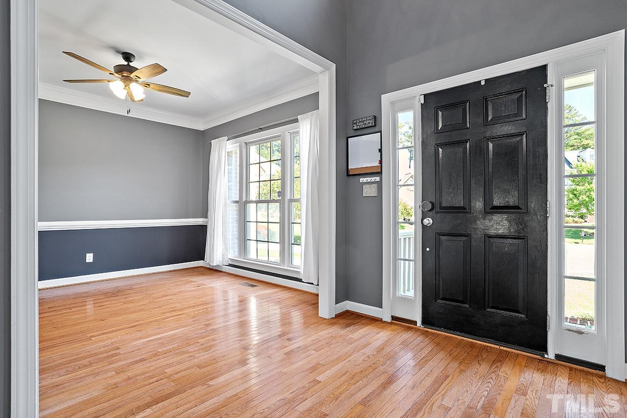 709 Rushing Falls Place Fuquay-Varina, NC 27526 - Photo 4 of 28 wooden floor in an empty room with a window