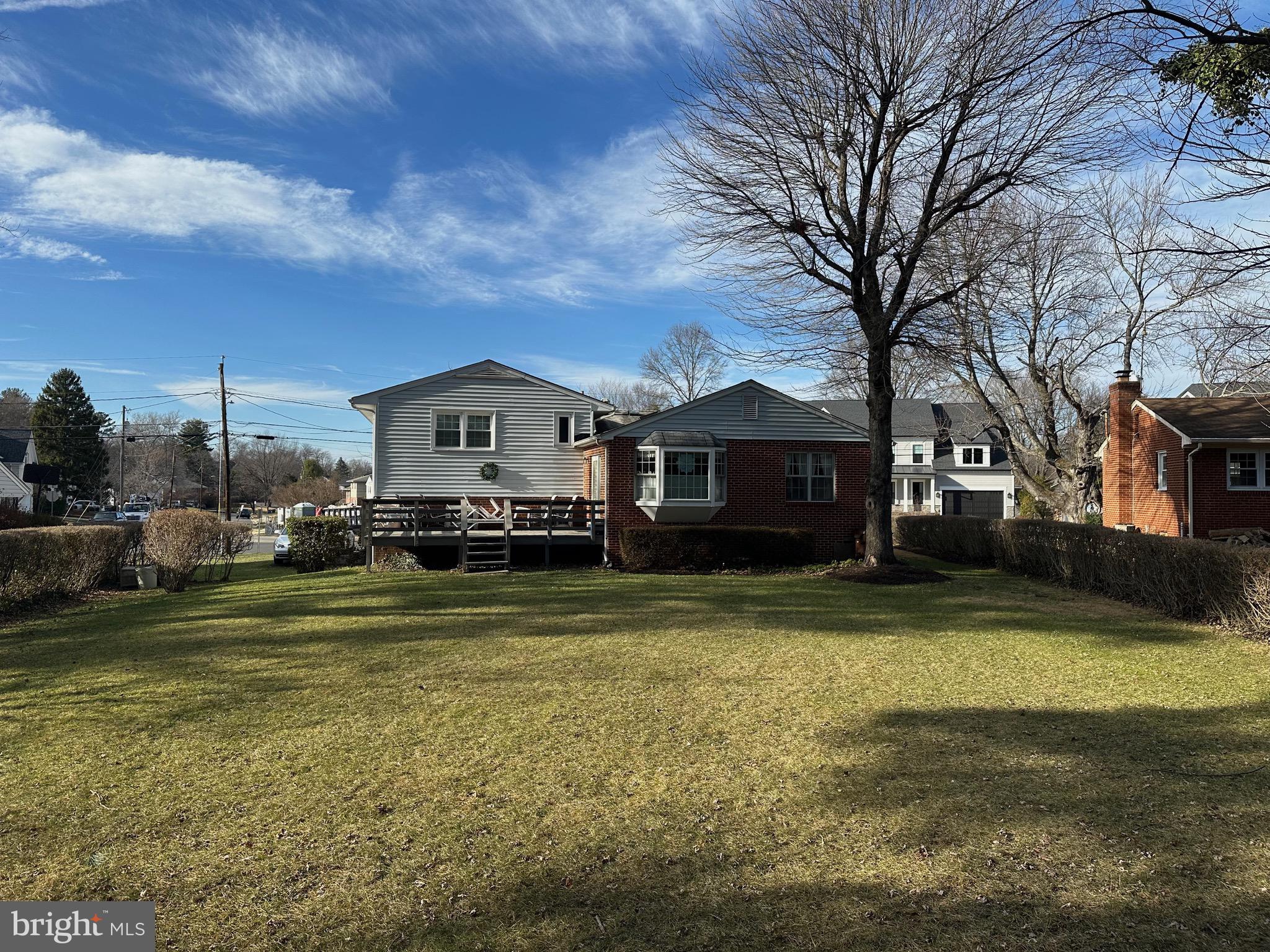 7105 Sea Cliff Road McLean, VA 22101 - Photo 3 of 6 a swimming pool is sitting in front of a house